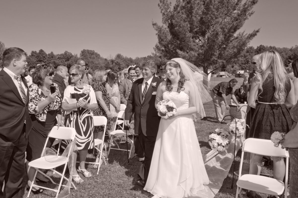 Andrea and Justin’s Charming Backyard Tent Wedding